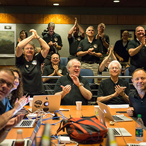 Part of the New Horizons team celebrating the spacecraft's flyby of Pluto.